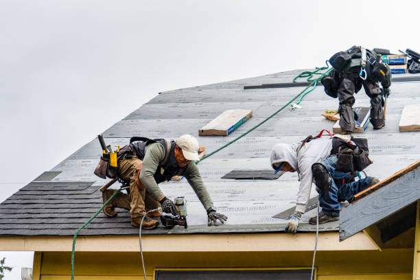Professional Roofing technician working in East Peoria, IL